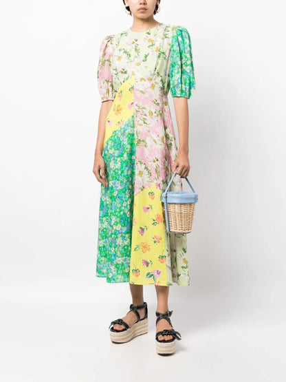Élise – Robe à Manches Bouffantes Imprimée et Coupe Cintrée, Élégante et Moderne