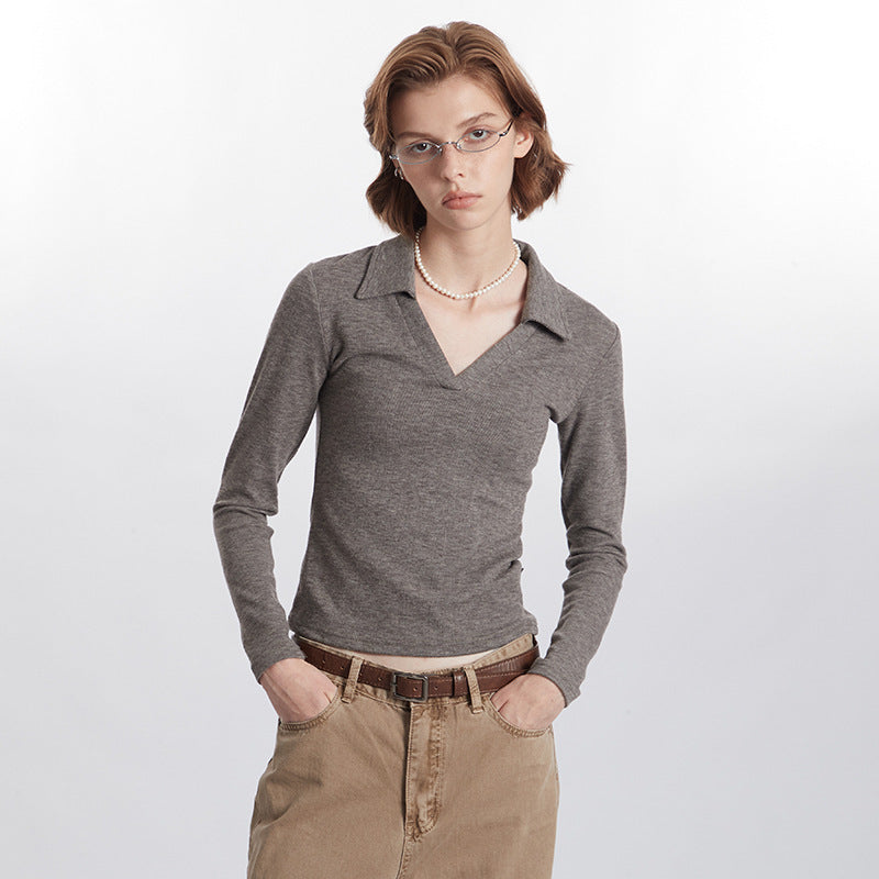 Clara – Polo cintré, élégance et confort intemporels, ajusté avec manches longues.
