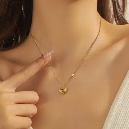 Collier Juliette – Cœur Gravé en Acier Inoxydable Doré, Élégance et Symbolisme