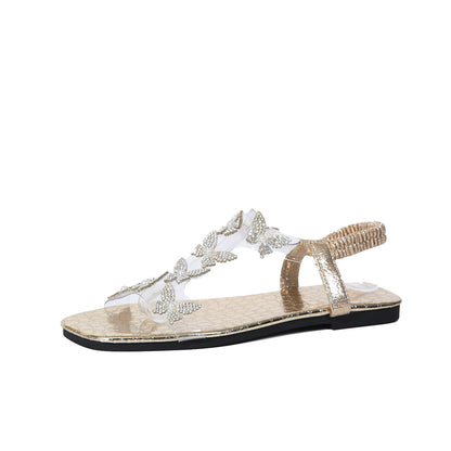 Papillon d’Été – Sandales plates scintillantes au charme délicat